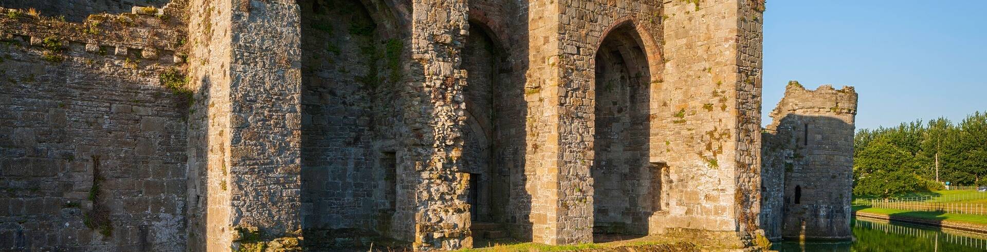 The historic Dolbadarn Castle perched on a hill overlooking The Royal Victoria Hotel in Llanberis."
