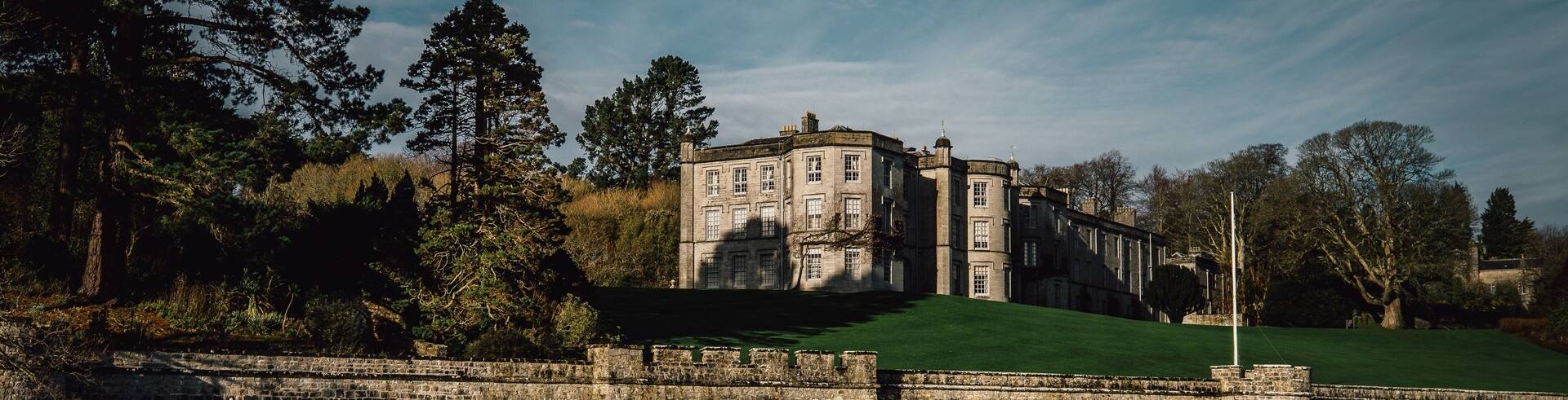 Plas Newydd country house with landscaped gardens overlooking the Menai Strait on Anglesey.